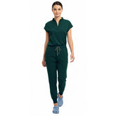 Medical professional stretching in Hunter Green 4-way stretch uniform showing flexibility