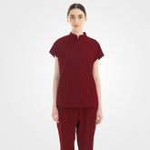Women's elegant burgundy slim fit scrubs on model