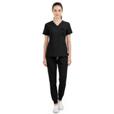 Vicogard Black jogger scrub set front view, sleek V-neck top with shoulder badge loop for estheticians