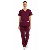 Model wearing the sophisticated vicogard Pro Custom Unisex Scrub Set in Burgundy