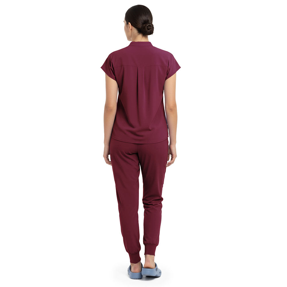 Back view of Burgundy minimal surgical scrubs, clean design with no pockets