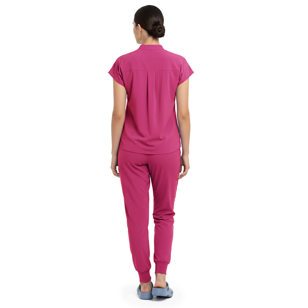 Back view of Rose Pink minimal surgical scrubs, clean design with no pockets
