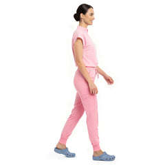 Side profile of Pink scrub pants showing zippered cargo pocket on leg