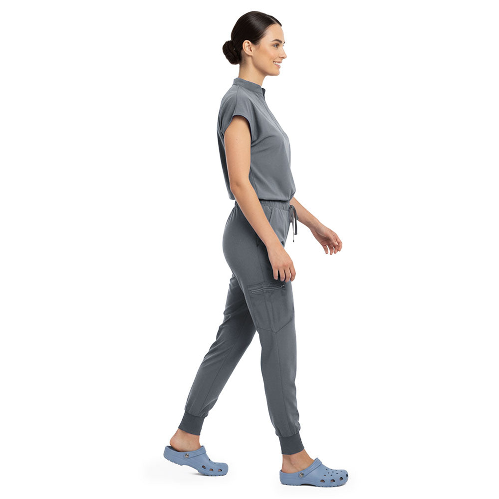 Side profile of Gray scrub pants showing zippered cargo pocket on leg