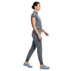 Side profile of Gray scrub pants showing zippered cargo pocket on leg
