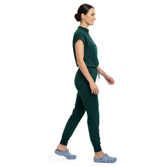Side profile of Hunter Green scrub pants showing zippered cargo pocket on leg