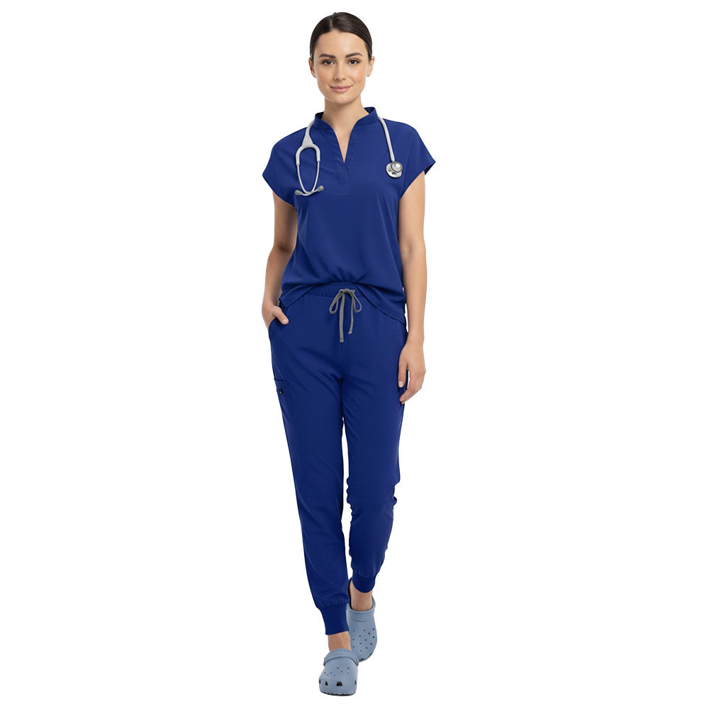 Surgeon wearing Royal Blue sterile-safe scrubs in a professional medical setting