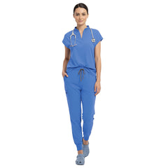 Nursing student wearing Ceil Blue sterile-safe scrubs in a standard hospital setting