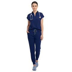 Surgeon wearing Navy Blue sterile-safe scrubs in a professional OR setting