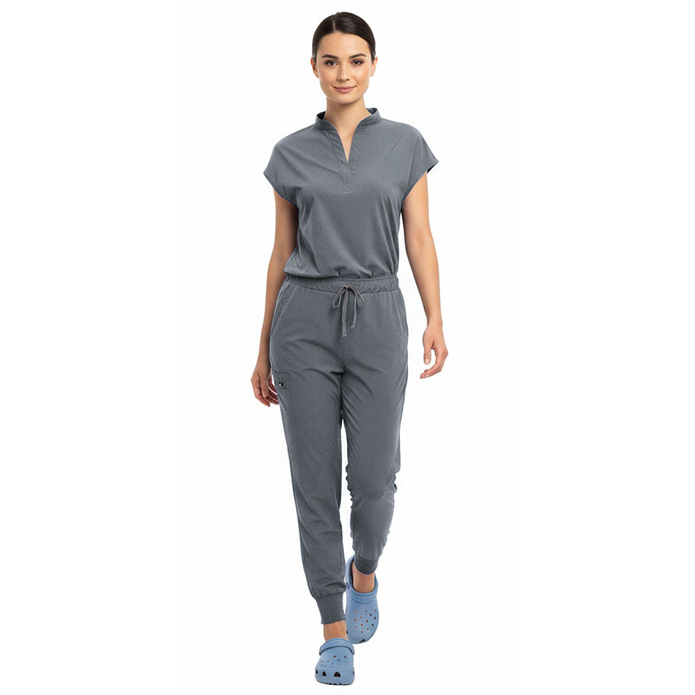 Medical professional stretching in Gray 4-way stretch uniform showing flexibility
