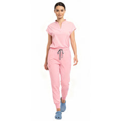 Medical professional stretching in Pink 4-way stretch uniform showing flexibility
