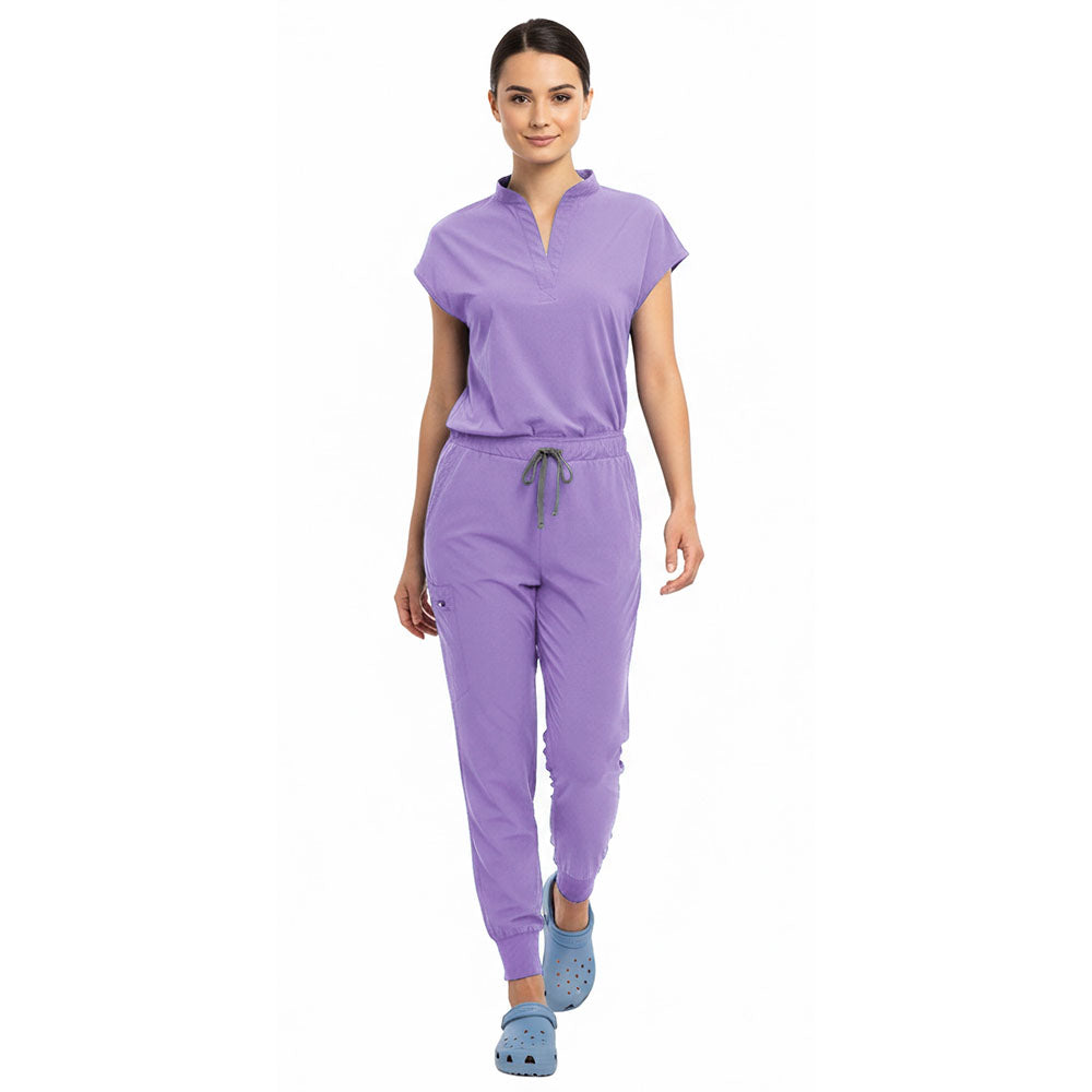 Medical professional stretching in Lavender 4-way stretch uniform showing flexibility