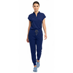 Medical professional stretching in Navy Blue 4-way stretch uniform showing flexibility
