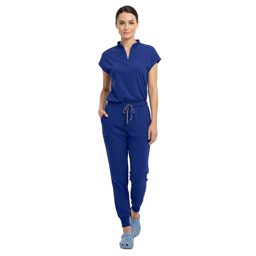 Doctor demonstrating side pocket access on Royal Blue zipper cargo pants