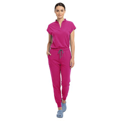 Doctor demonstrating side pocket access on Rose Pink zipper cargo pants