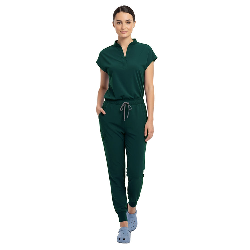 Doctor demonstrating side pocket access on Hunter Green zipper cargo pants