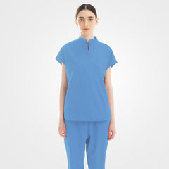 Women's ceil blue slim fit scrubs on model