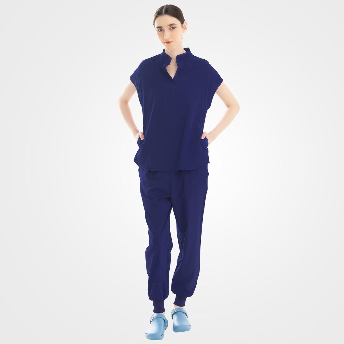 Navy blue slim fit scrub top and cargo pants front view