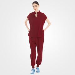 Burgundy scrub top with hidden pockets and cargo pants front