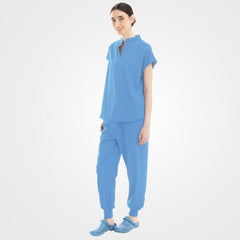 Light blue medical scrubs side profile showing zippered pocket