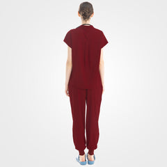 Lounge-inspired back contour on burgundy nursing scrubs