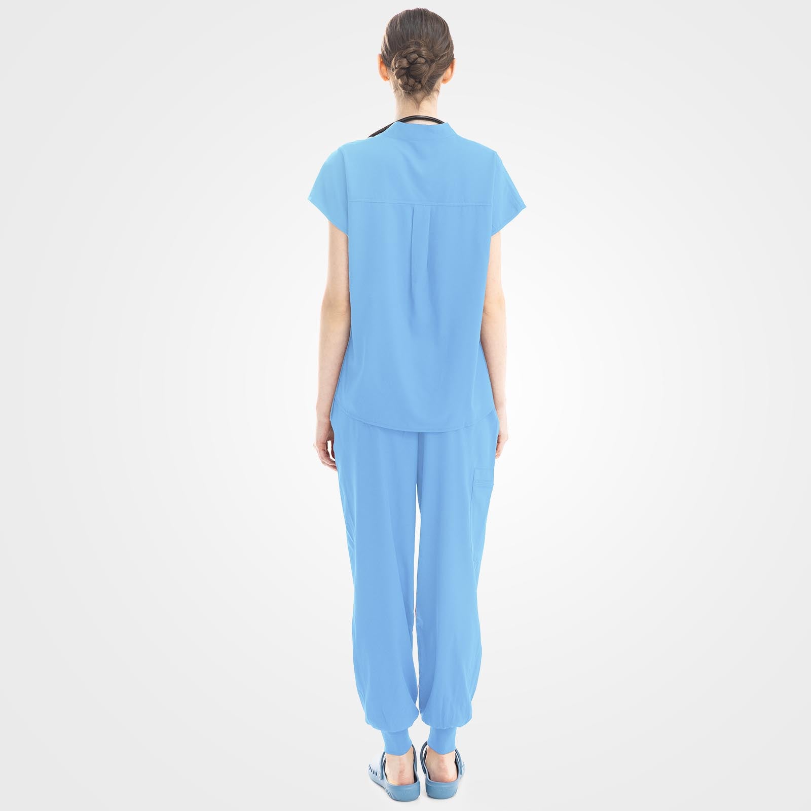 Lounge-inspired back contour on ceil blue scrubs