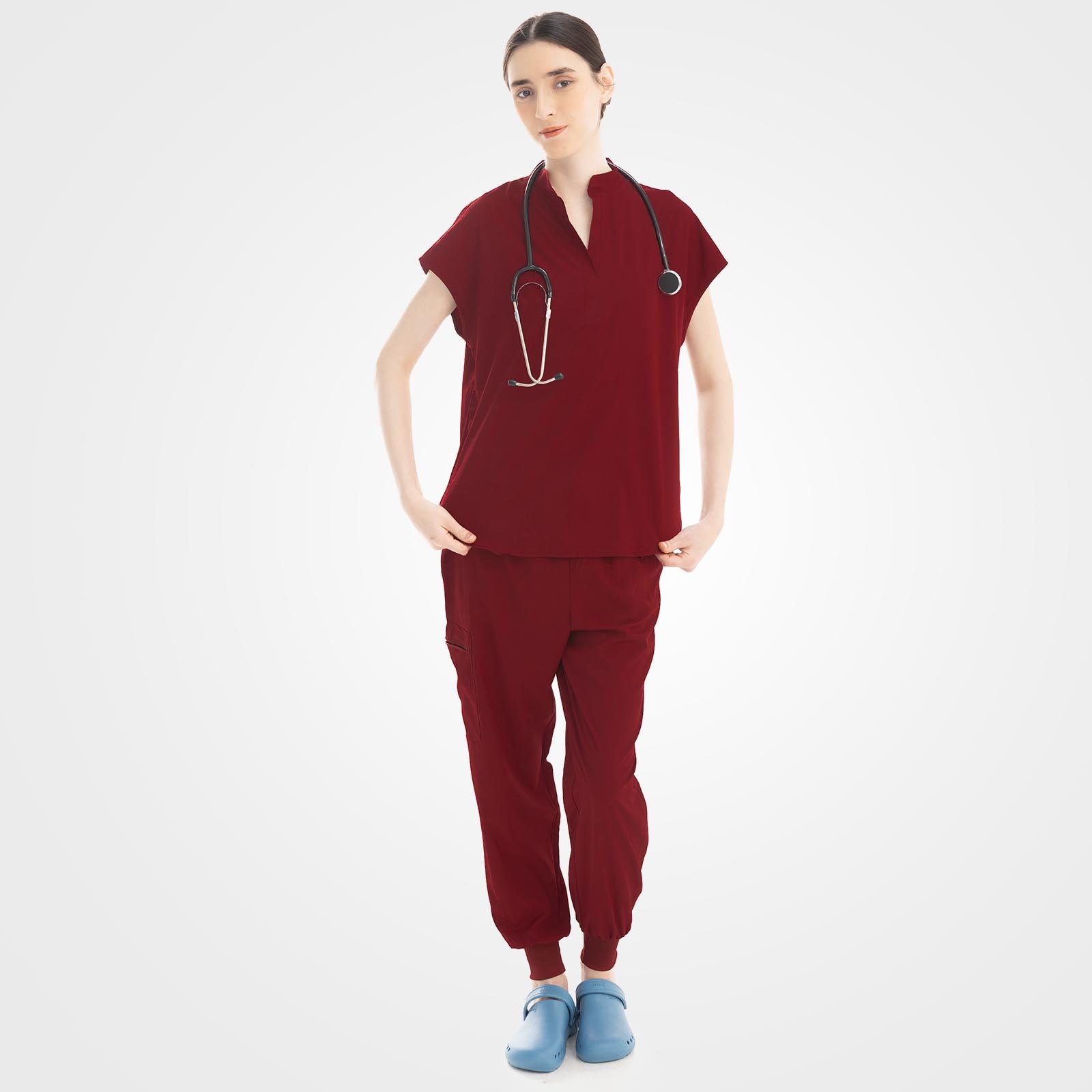 Burgundy scrub pants double layered cargo pocket detail