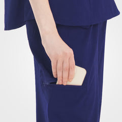 Slim fit scrub top hidden side hem pocket detail