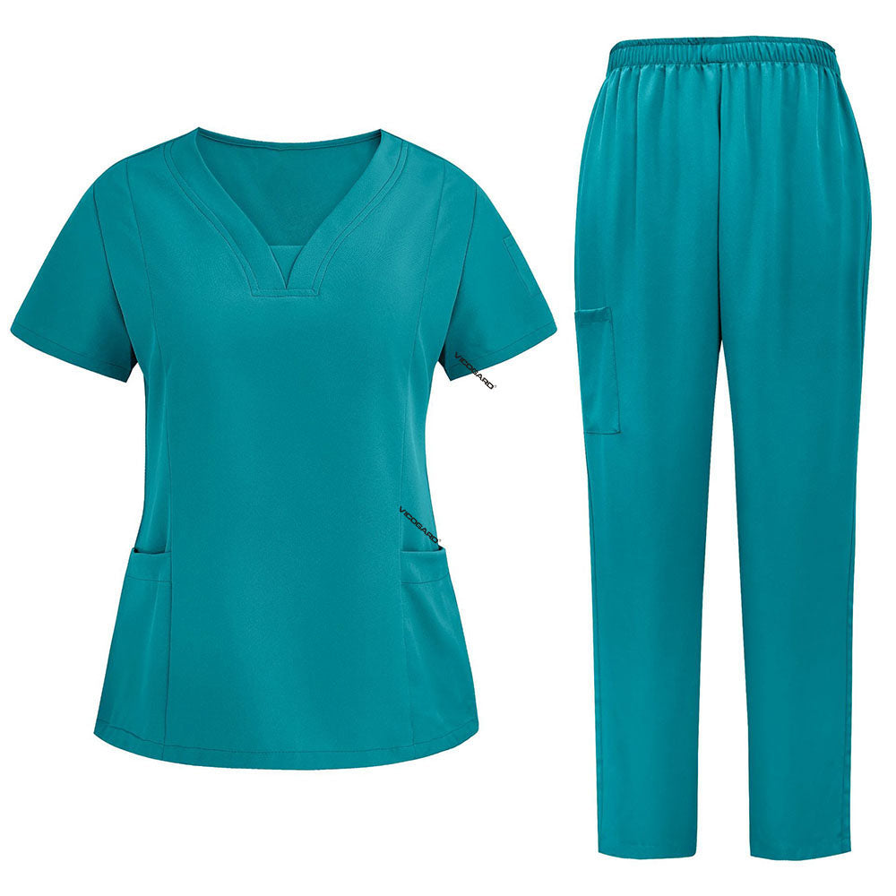 Side profile of Teal nursing scrubs showing relaxed straight leg fit and drape