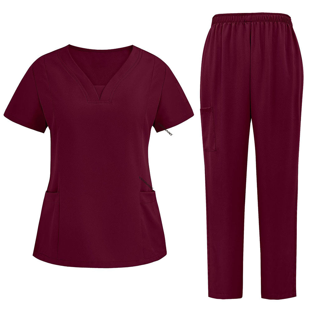 Flat lay of Burgundy 3-pocket scrub set featuring V-neck top and straight leg pants