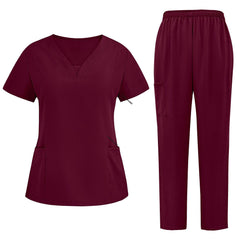Flat lay of Burgundy 3-pocket scrub set featuring V-neck top and straight leg pants