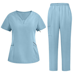 Flat lay of Ceil Blue 3-pocket scrub set featuring V-neck top and straight leg pants