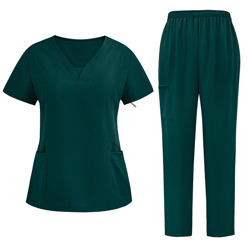 Flat lay of Hunter Green 3-pocket scrub set featuring V-neck top and straight leg pants