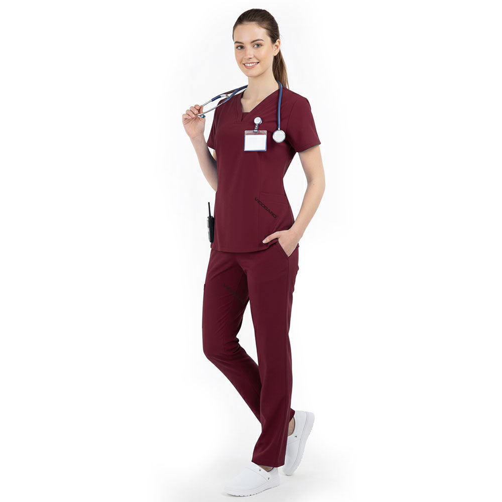 Side profile of Burgundy nursing scrubs showing relaxed straight leg fit and drape