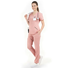 Side profile of Pink nursing scrubs showing relaxed straight leg fit and drape