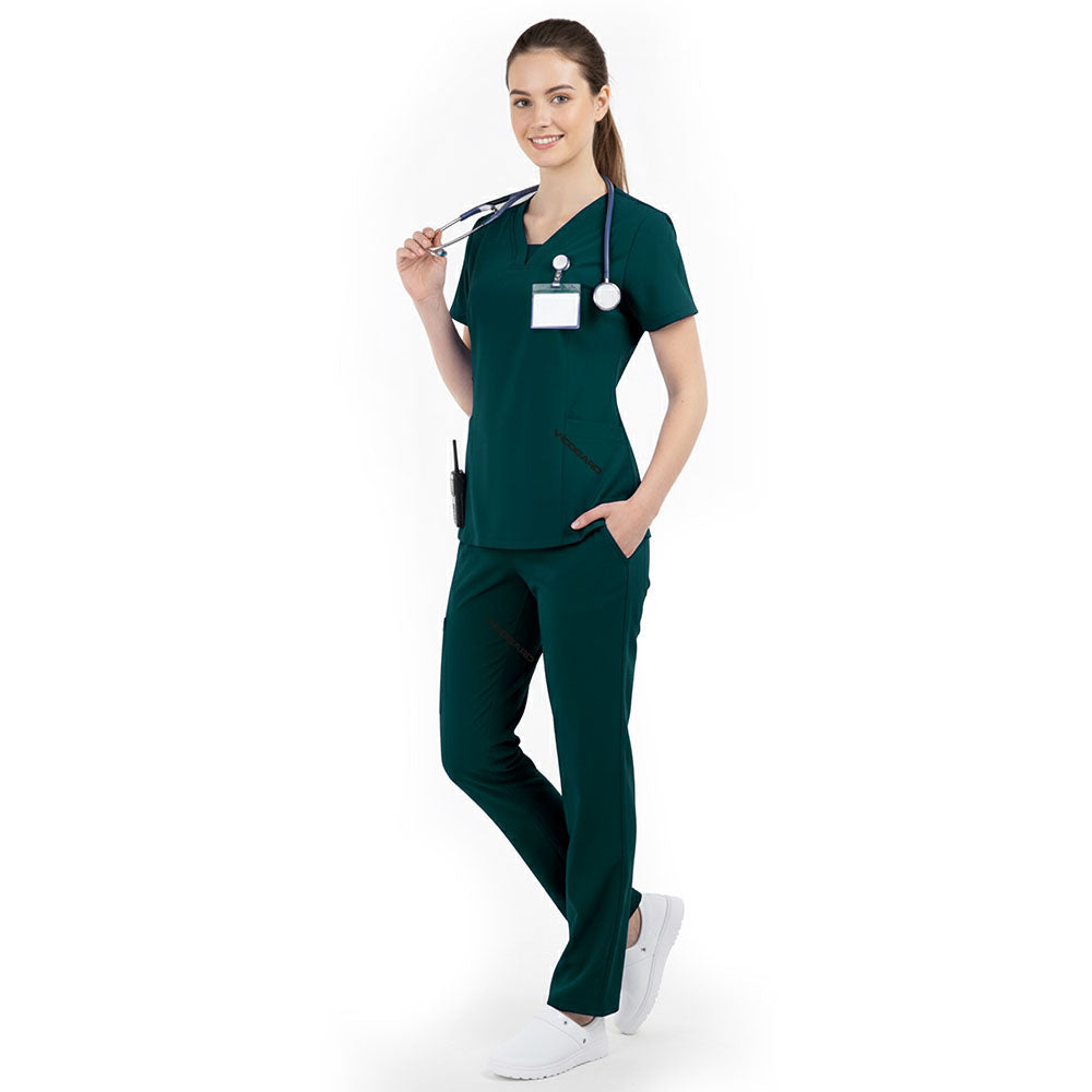 Side profile of Hunter Green nursing scrubs showing relaxed straight leg fit and drape