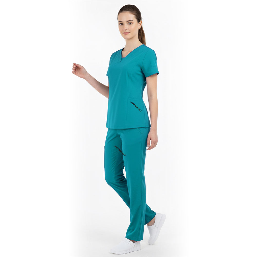 Side view of Teal medical uniform showing side vents and durable fabric