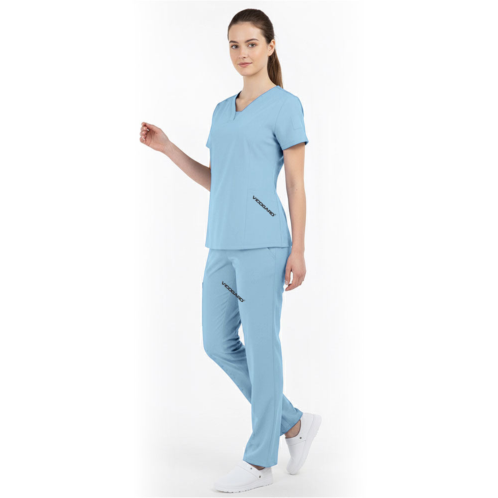 Side view of Ceil Blue medical uniform showing side vents and clean fabric