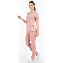Side view of Pink medical uniform showing side vents and soft fabric