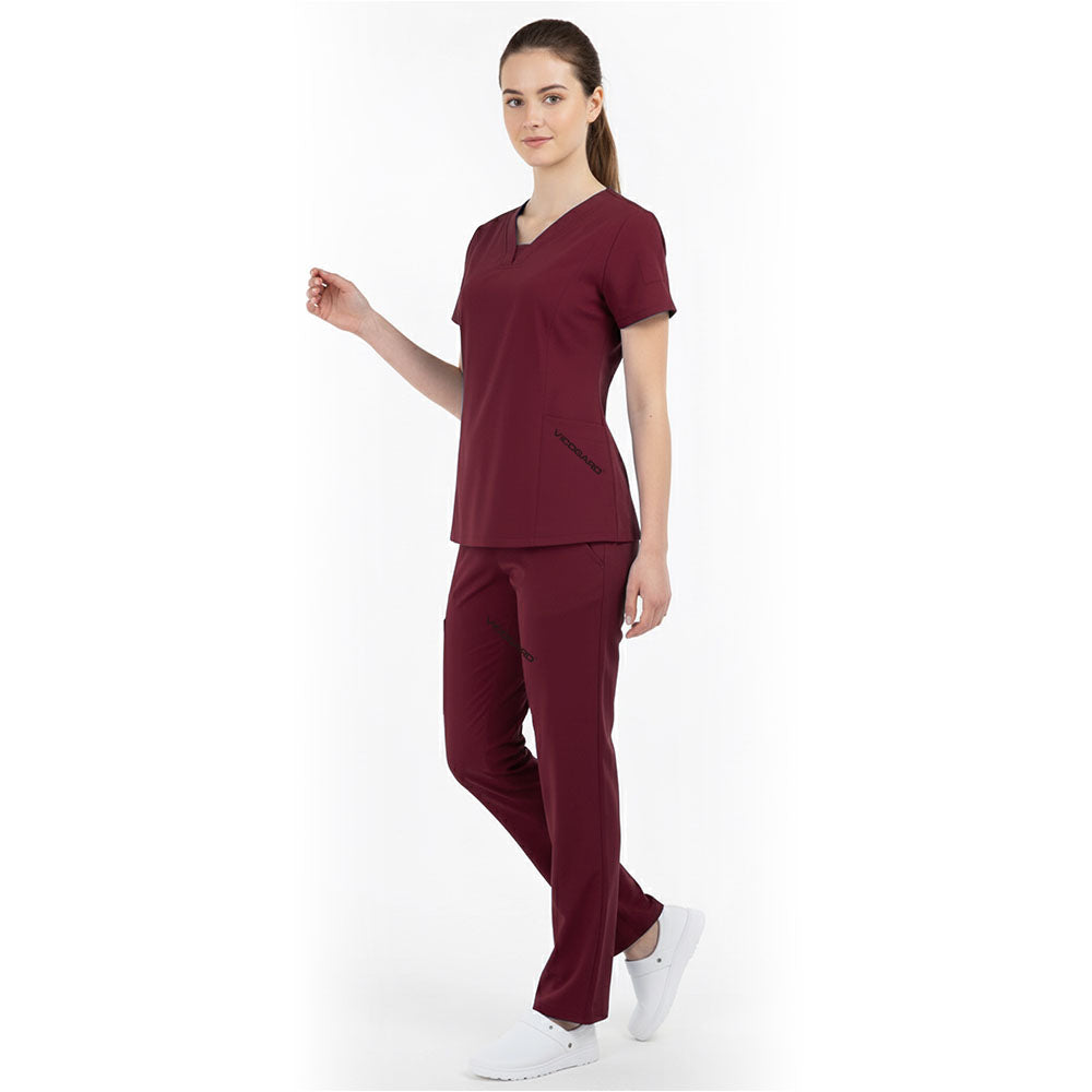 Side view of Burgundy medical uniform showing side vents and durable fabric