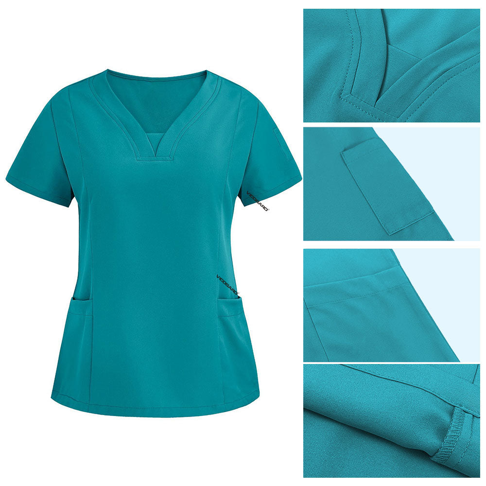 Detail of Teal scrub top V-neckline and reinforced lower patch pockets