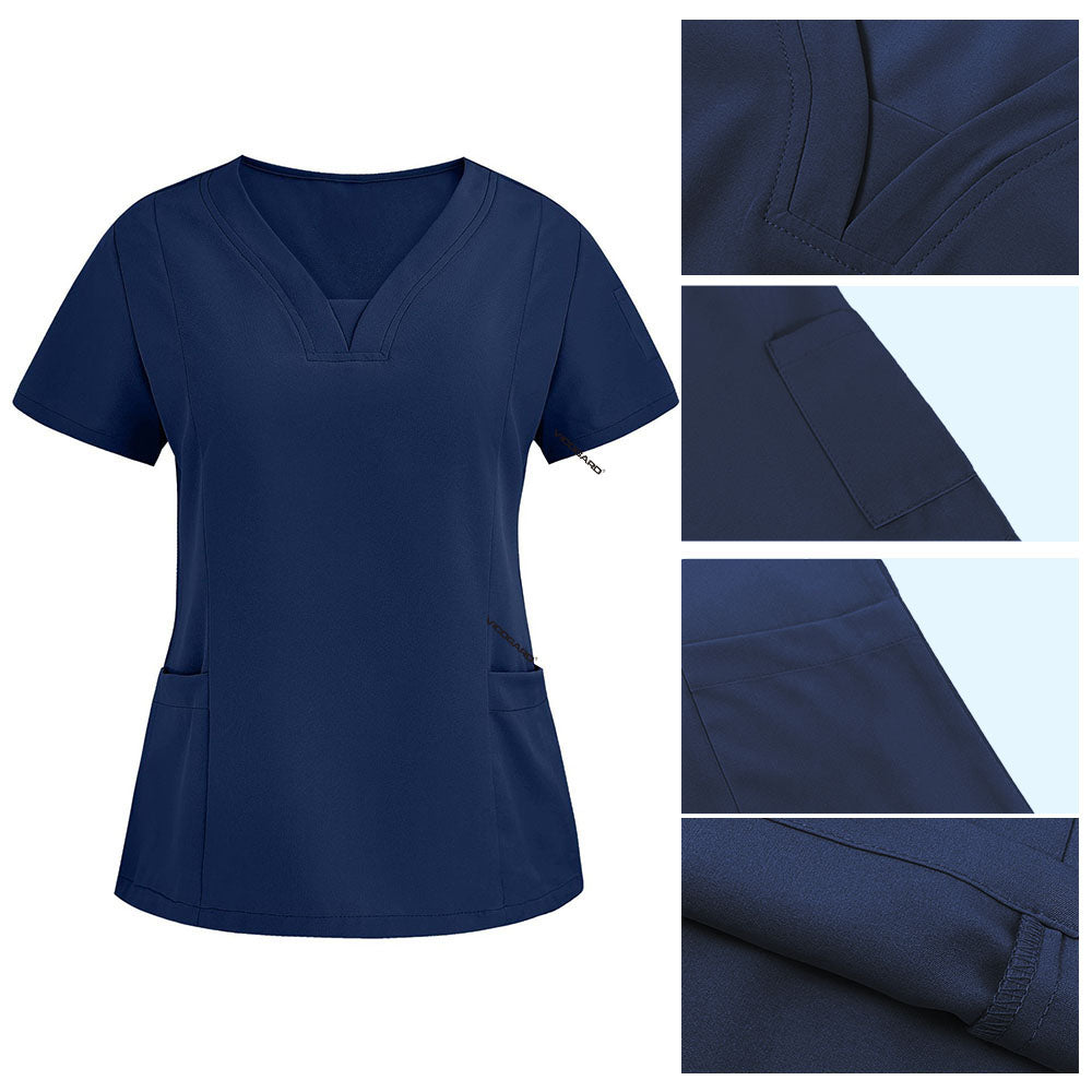Detail of Navy Blue scrub top V-neckline and reinforced lower patch pockets