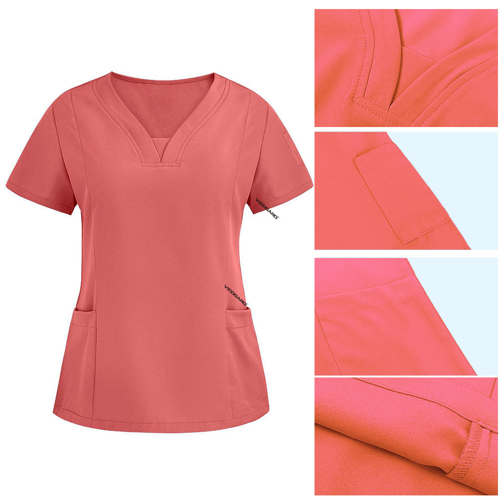 Detail of Orange Red scrub top V-neckline and reinforced lower patch pockets