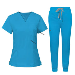 Flat lay of Royal Blue utility scrub set featuring 3-pocket top and 8-pocket jogger pants