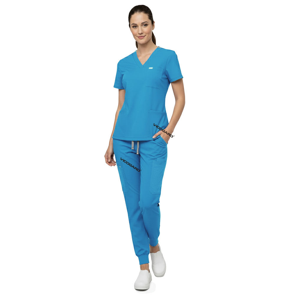 Model demonstrating deep cargo pocket storage on Royal Blue 8-pocket scrub joggers