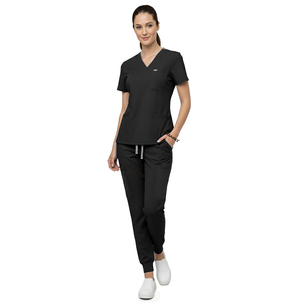 Model demonstrating deep cargo pocket storage on Black 8-pocket scrub joggers