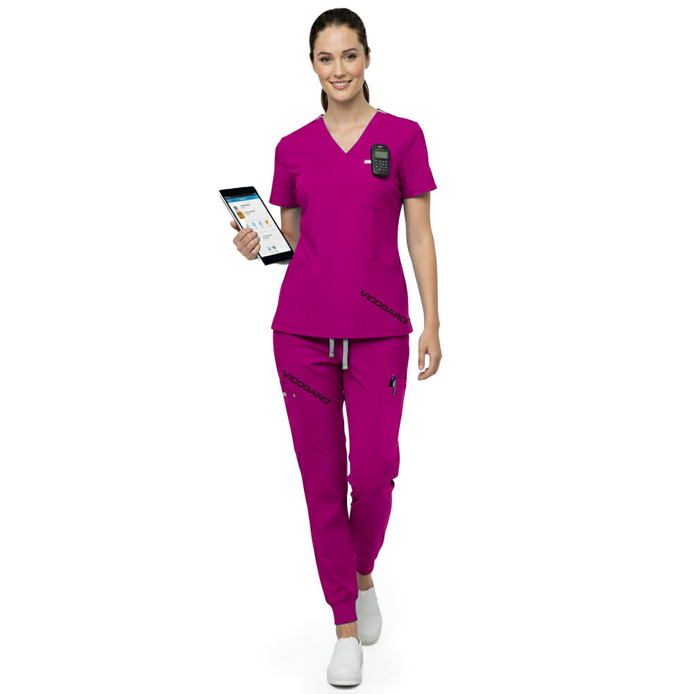 Front view of Rose Pink multi-pocket scrubs showing utility and storage for busy shifts