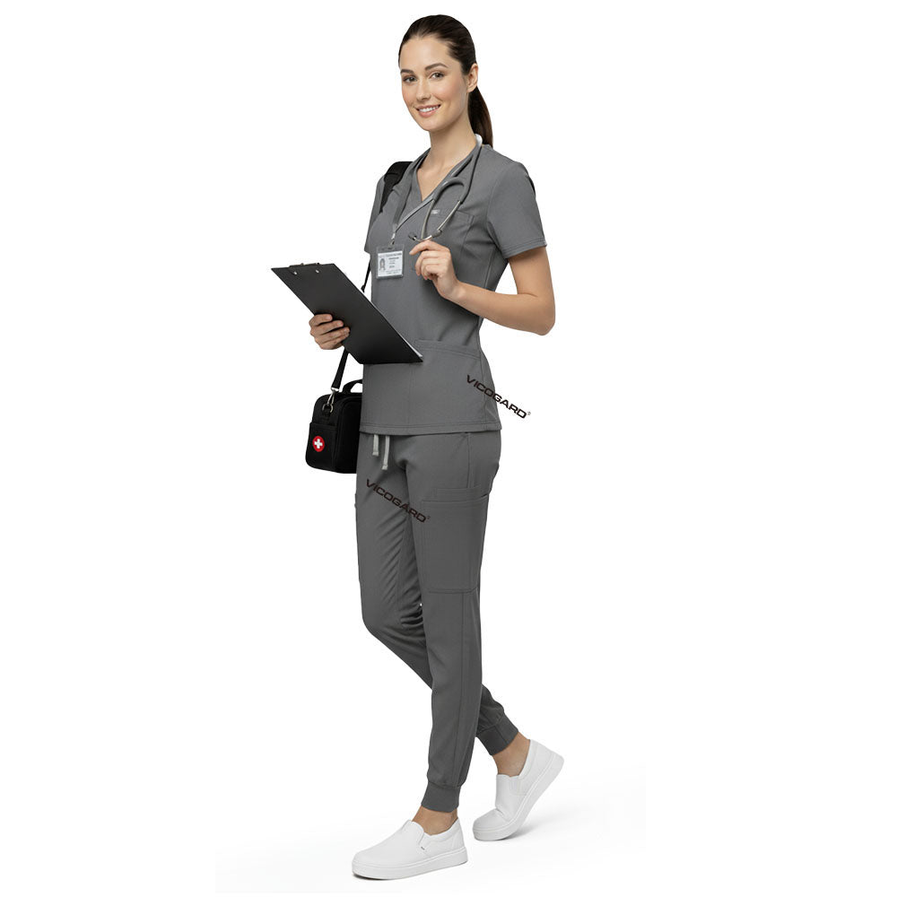 Front view of Gray multi-pocket scrubs showing utility and storage for daily clinic essentials