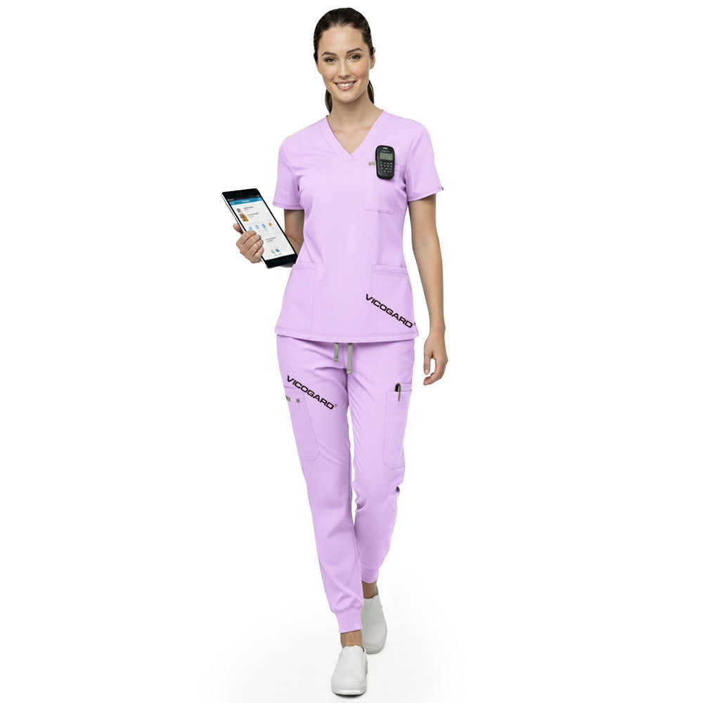 Front view of Lavender multi-pocket scrubs showing utility and storage for daily care essentials