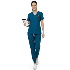 Front view of Caribbean Blue multi-pocket scrubs showing utility and storage for vibrant medical settings